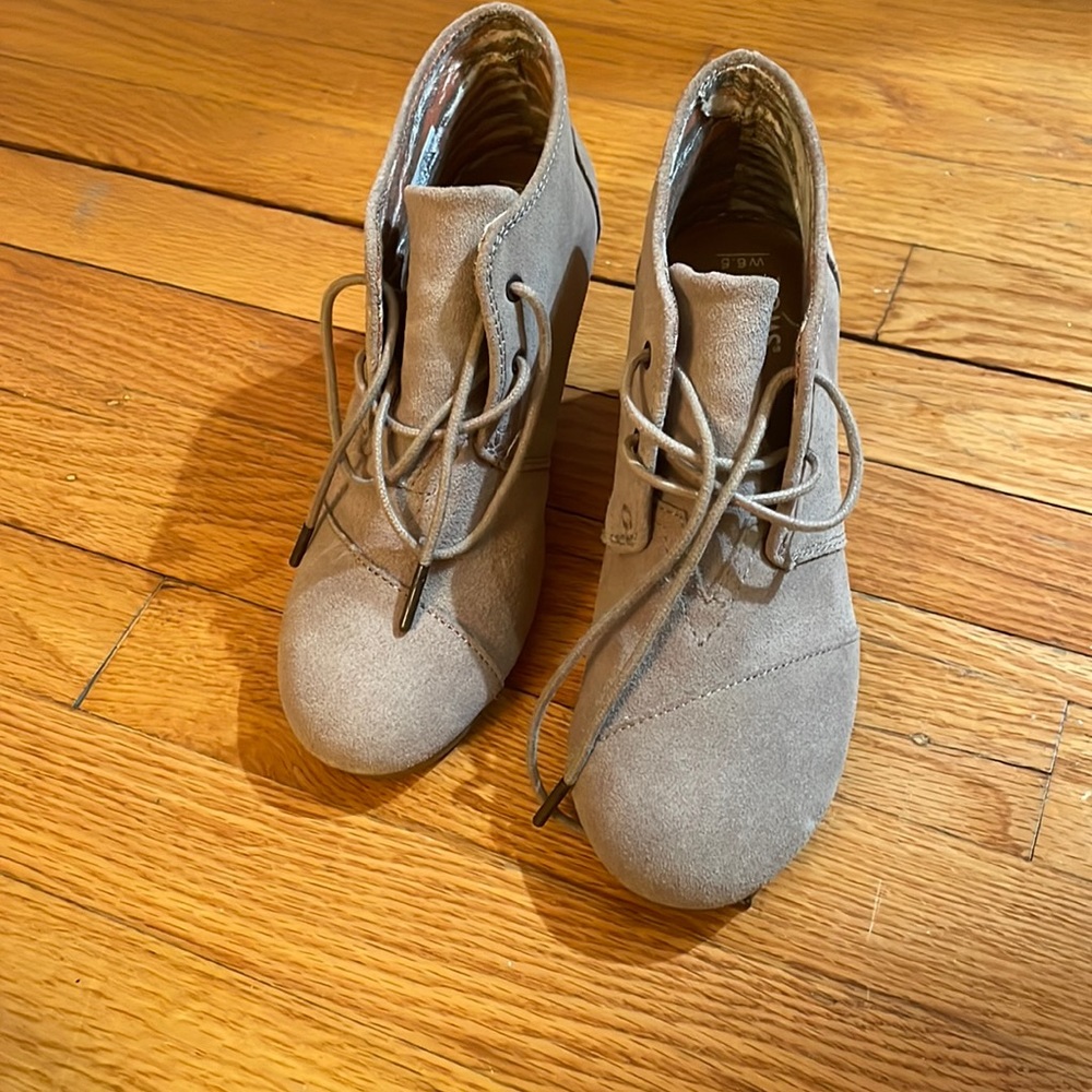 Grey gently used Tom’s wedge heels